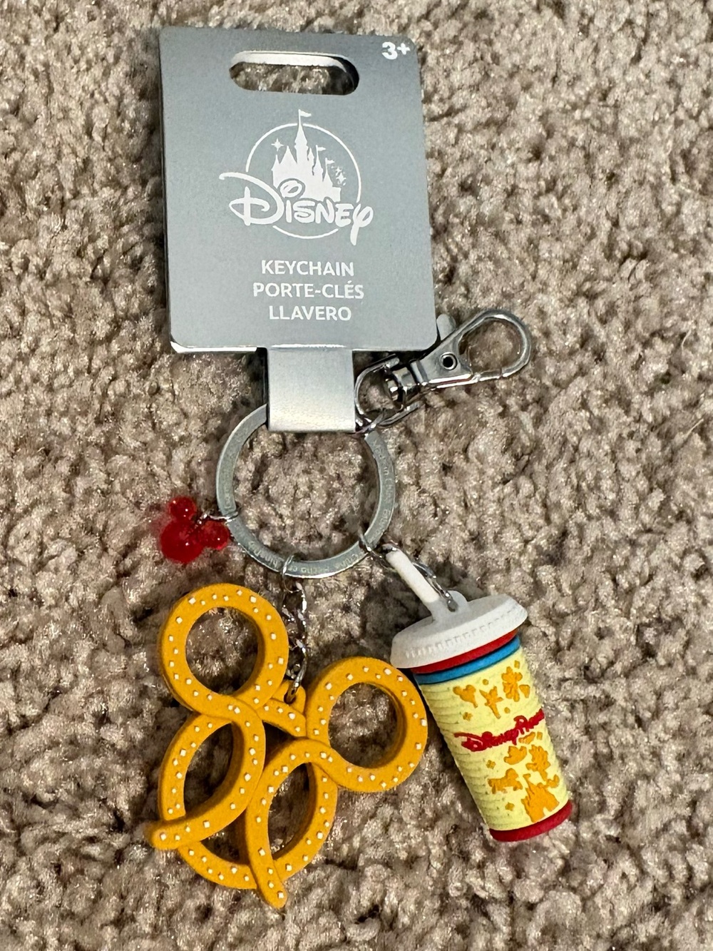 Disney Parks keychain featuring Mickey Pretzel 🥨 and cup charm